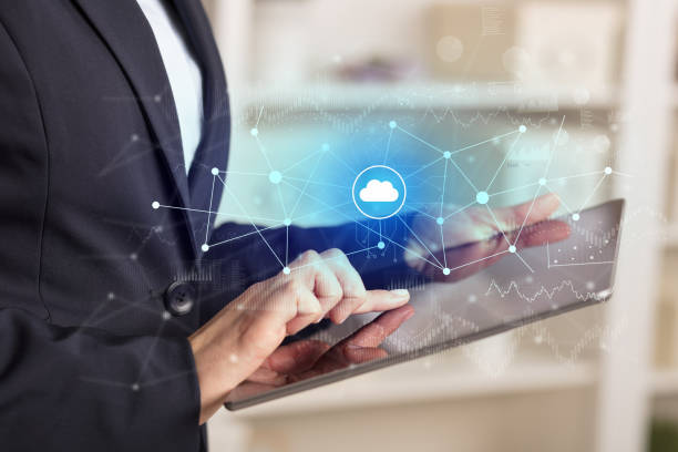 istock Business woman using tablet with cloud connection concept 1202505939