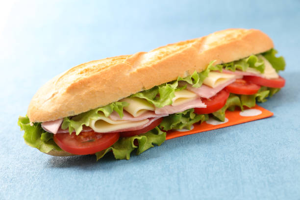 istock sandwich- bread with ham, cheese and tomato 1202506891