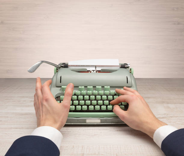 istock First person perspectve hand writing on an oldschool typewriter 1202506965