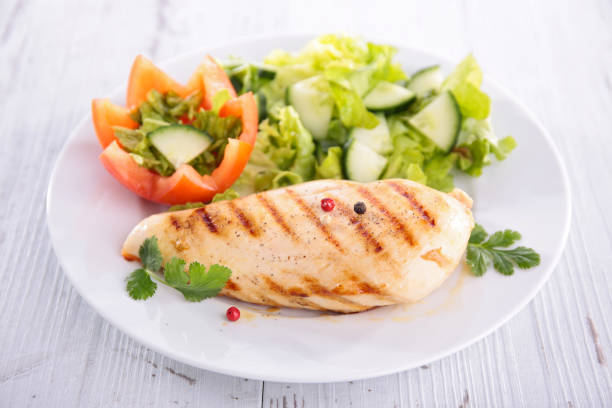 istock chicken fillet and vegetable salad 1202506975