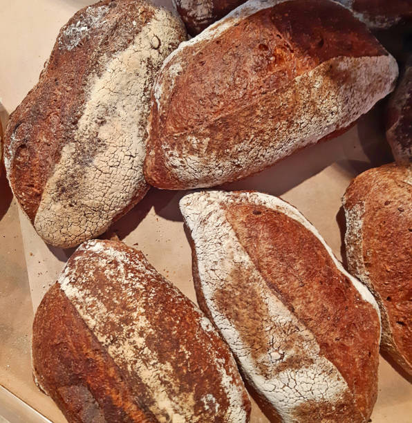 istock Real whole grain rye, oats and wheat bread 1202507317