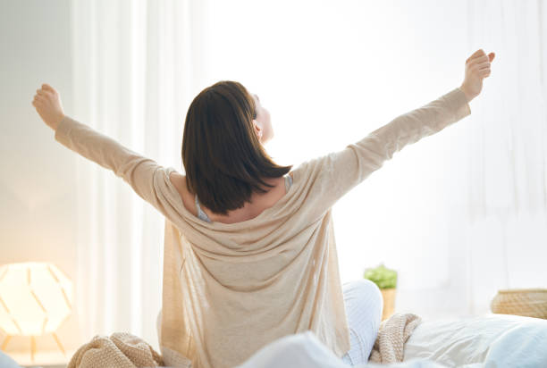 istock woman enjoying sunny morning 1202508163