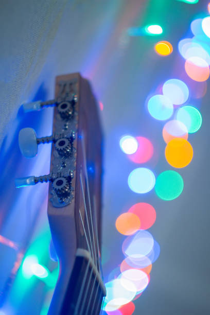 istock Guitar with single coil pickups at blurred interior 1202510893