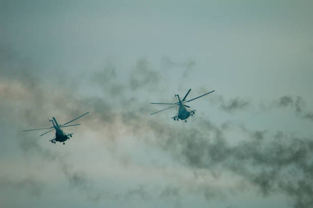 istock Military helicopter fired anti-armor missiles at sunset 1202510896