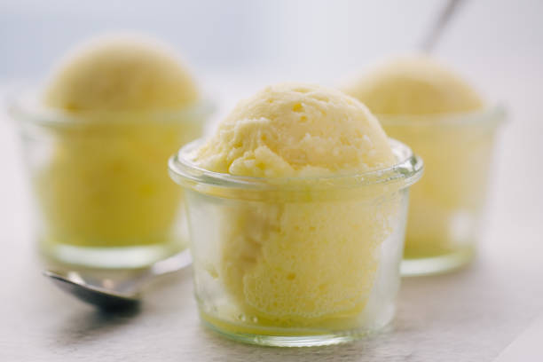 Yellow ice cream served in glass