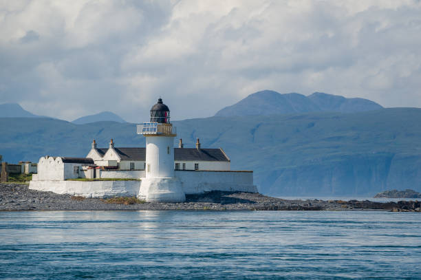 istock Lighthouse complex at small island near Oban 1202512755