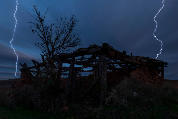 Dark, stormy turbulent sky over the ruins of St. Ivan Rilski church near Jrebchevo dam/ Bulgaria. Severe thunderstorm approach