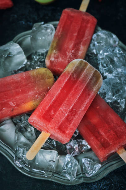 istock Watermelon Kiwi Fruit Popsicle's on Ice 1202518313