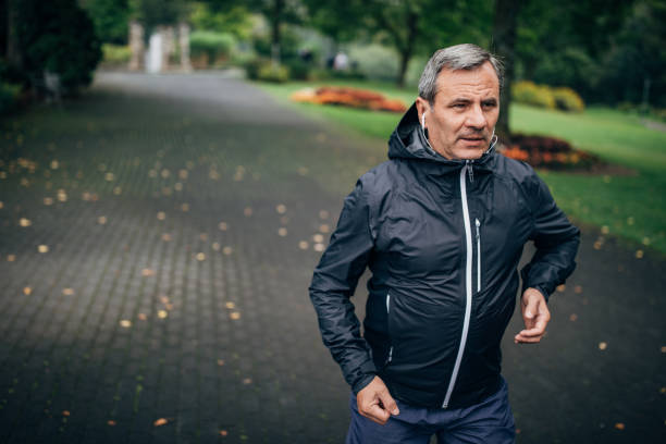 istock morning jogging in a public park 1202519179