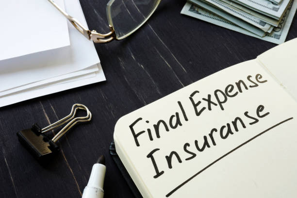 Final expense insurance memo in the black notepad. Final expense insurance memo in the black notepad. funeral expense stock pictures, royalty-free photos & images
