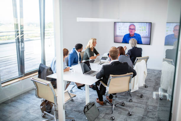 istock Businesspeople Participating in Video Conference 1202520772