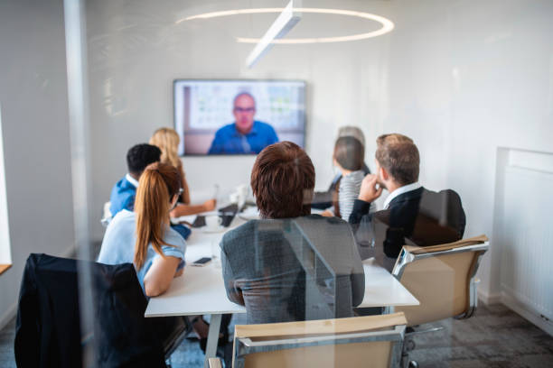istock Business Associates Participating in Video Conference 1202520776