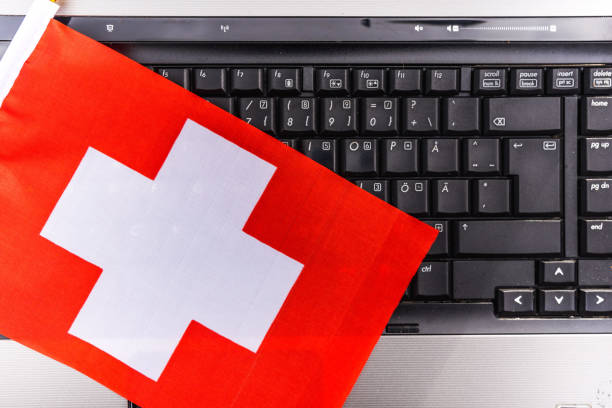 flag of Switzerland on computer, laptop keyboard