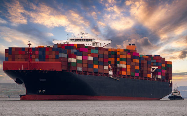 istock Container ship in export and import business and logistics. 1202524108