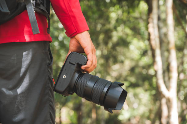 istock Hikers are carrying cameras to capture nature. 1202525091