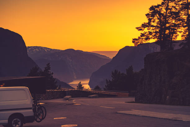 Van on parking area at Stegastein viewpoint Norway Van with bicycle on Parking area at Stegastein viewpoint, road Aurlandsfjellet, Norway Scandinavia. Tourism vacation and active lifestyle. stegastein viewpoint stock pictures, royalty-free photos & images