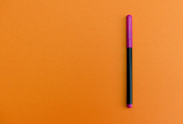 istock Color marker on blank colored paper 1202525894