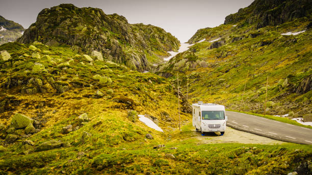 istock Camper car in norwegian mountains 1202527614