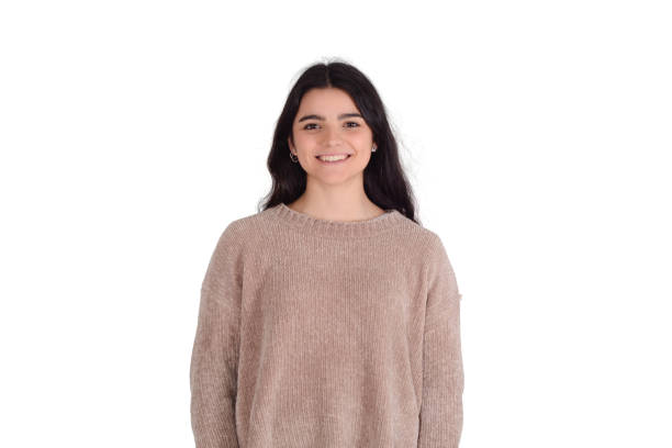 istock Young woman looking at camera and smiling. 1202528669