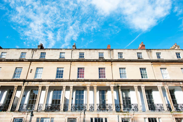 Ornate canopied balconies on historic terraced houses in Caledonia Place, Bristol, UK