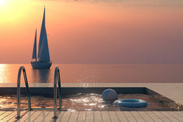 istock Summer Concept with Swimming Pool, Sea and Sailboat 1202531734