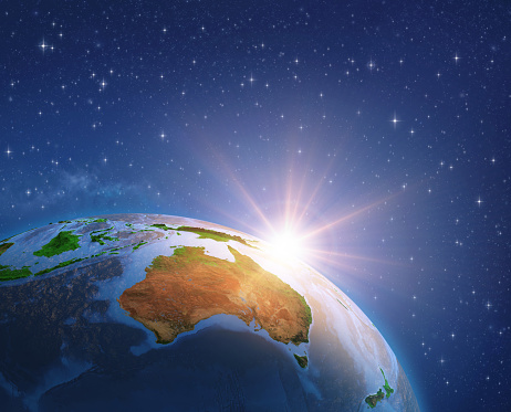 Surface of the Planet Earth viewed from a satellite, focused on Australia, sun rising on the horizon. 3D illustration (Blender software) - Elements of this image furnished by NASA (https://eoimages.gsfc.nasa.gov/images/imagerecords/73000/73776/world.topo.bathy.200408.3x5400x2700.jpg).