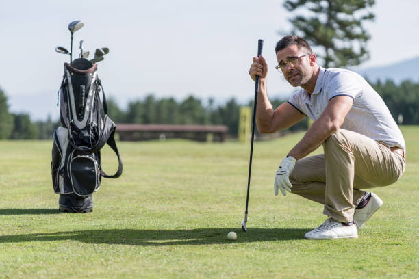 istock Male golf payer at the golf course 1202532029