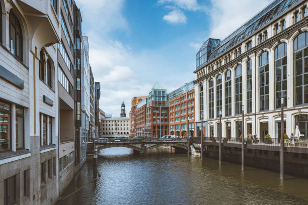 historic Bleichenfleet with in Hamburg old town with churchtower in the background