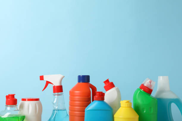 istock Group of bottles with detergent on blue background, space for text 1202534842