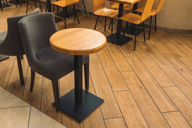 istock hipster style cafe interior, circle table and empty chair 1202535220
