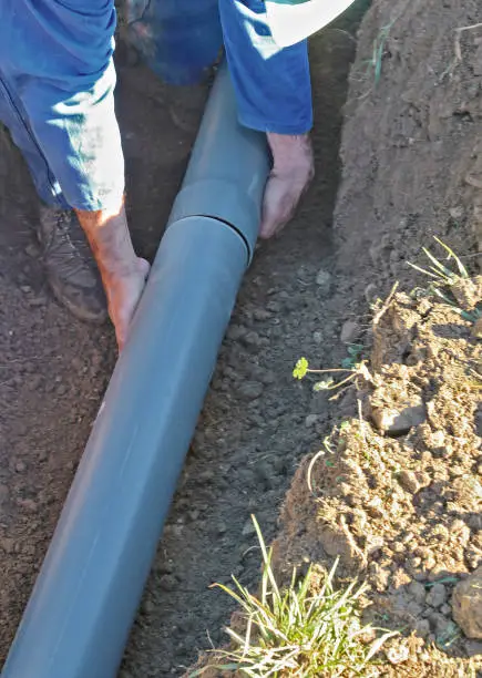 Photo of Connection of PVC drainage pipes.
