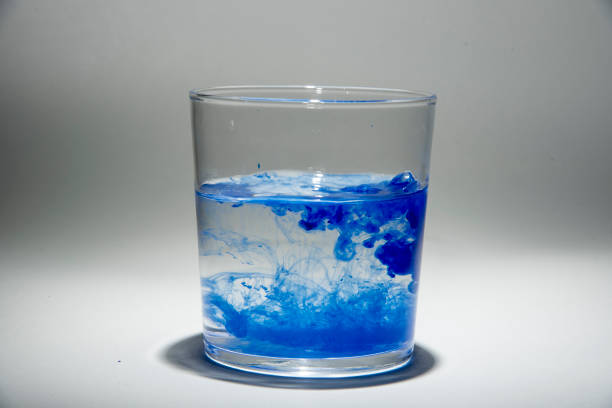 istock Watercolor pigment on transparent water 1202538922