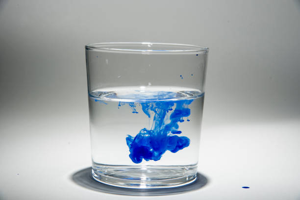 istock Watercolor pigment on transparent water 1202538974