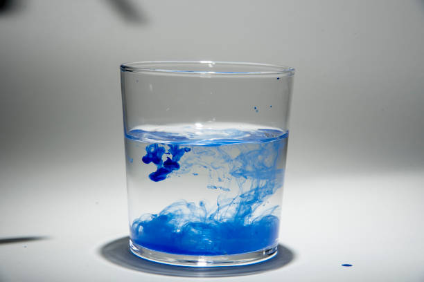 istock Watercolor pigment on transparent water 1202539044
