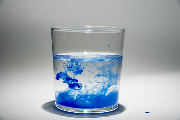 istock Watercolor pigment on transparent water 1202539129