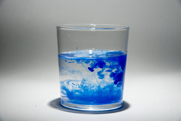 istock Watercolor pigment on transparent water 1202539130