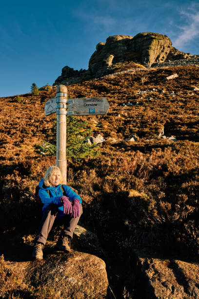 istock Woman on Bennachie hiking trail, Aberdeenshire, Scotland 1202540407
