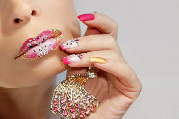 istock Creative lip makeup and trendy nail art manicure 1202540525