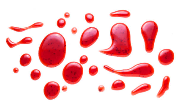 istock red raspberries jam splash isolated on white background 1202542204
