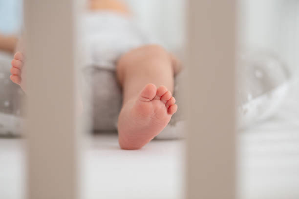 istock Close up of a baby's leg 1202543000