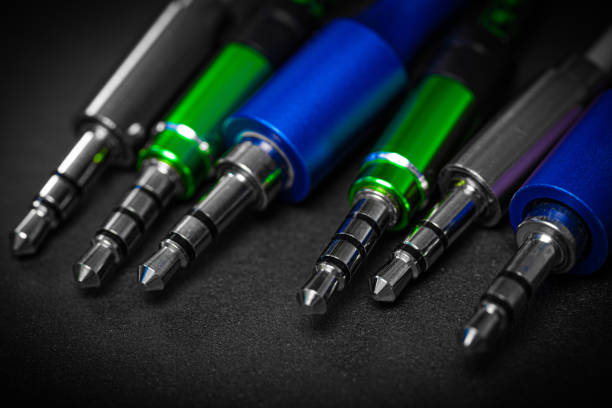 istock speaker cables 3.5 jack. against a dark background 1202544774
