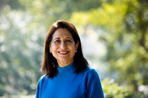 istock Confident senior woman looking at camera outdoor 1202544792