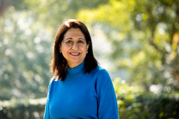 istock Confident senior woman looking at camera outdoor 1202544945