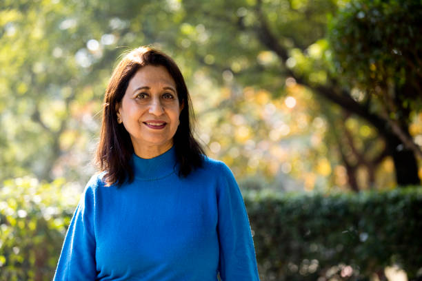 istock Confident senior woman looking at camera outdoor 1202546263