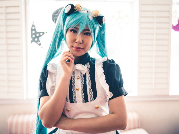Asian woman cosplay story Millennial Asian woman of Taiwanese decent dressed in cosplay anime character. She is goofing at the ice cream parlor. cosplay stock pictures, royalty-free photos & images