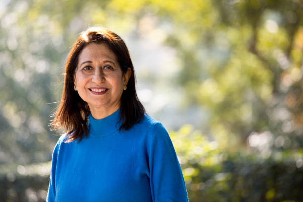 istock Confident senior woman looking at camera outdoor 1202546902