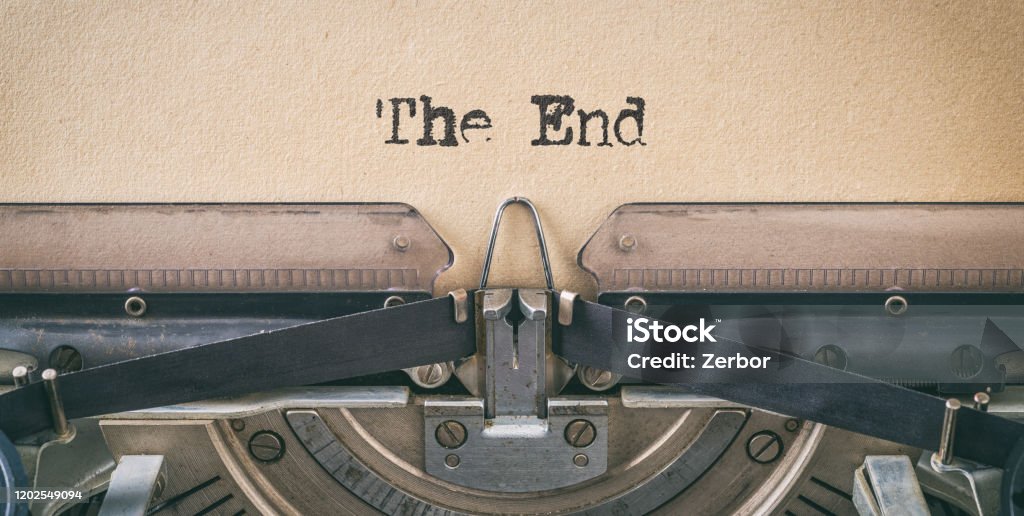 Text written with a vintage typewriter -  The end The End Stock Photo
