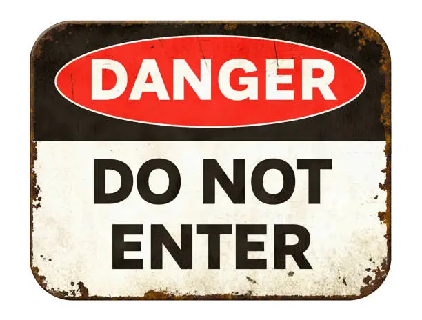 Photo of Vintage tin danger sign on a white background - Do not enter