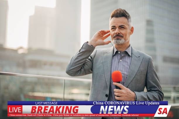 istock Breaking news reporter reporting on coronavirus from Shanghai 1202550031