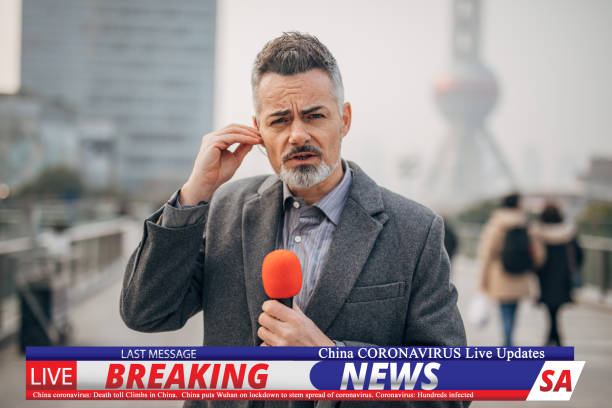 istock Breaking news reporter reporting on coronavirus from China 1202550120